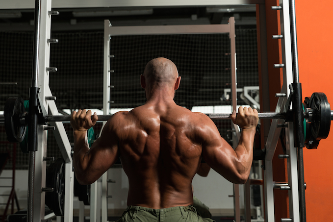 Smith Machine Bench Press: Form, Benefits, Myths, & Variations